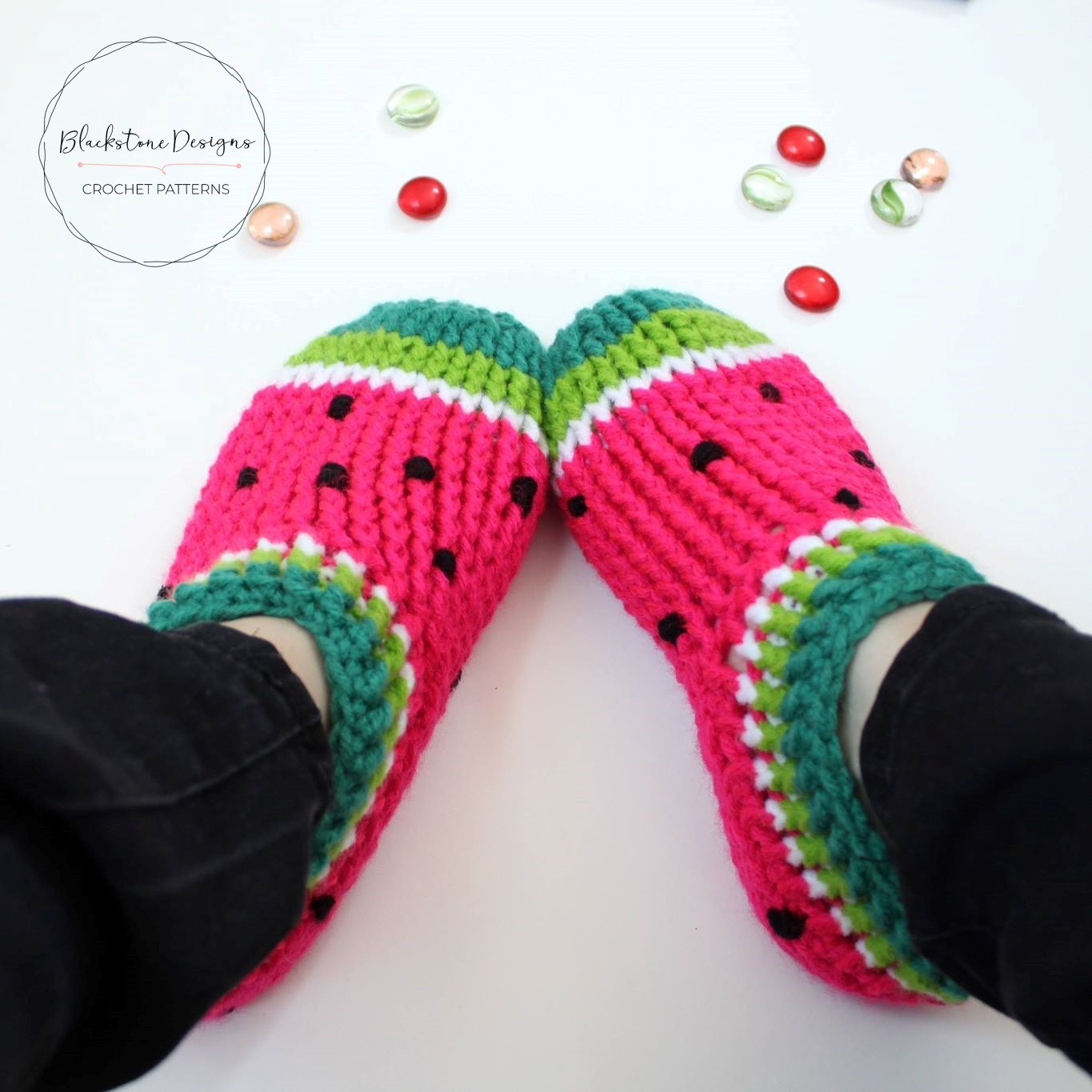 Crochet Watermelon Chunky Slippers made with front post double crochets in bright pink, lime green, and medium green