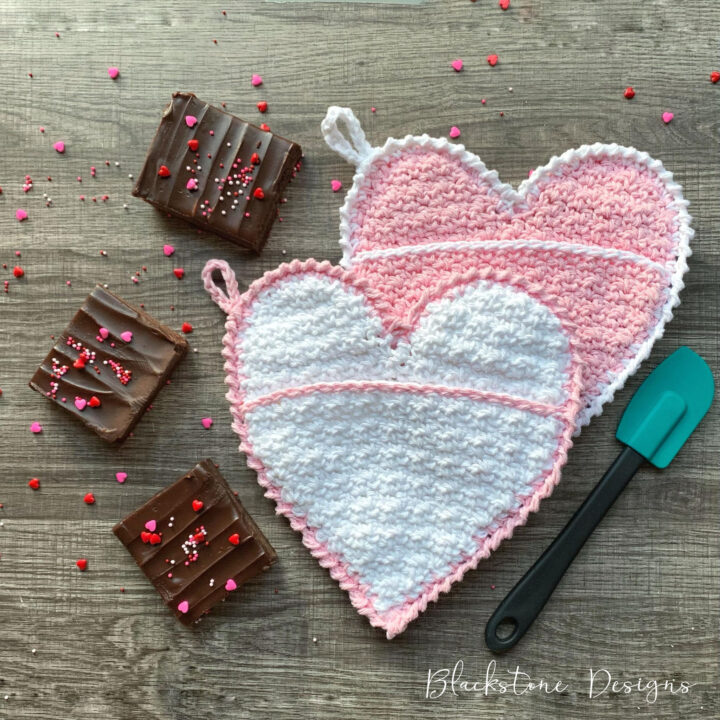 Heart Shaped Pot Holder Free Crochet Pattern in pink and white cotton yarn