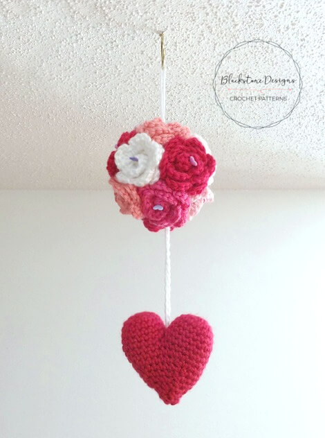 Crochet Kissing Ball Pattern made from crochet roses and a dangling stuffed crochet heart