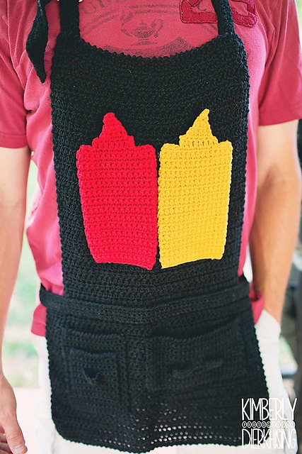 BBQ Toolbelt Apron Crochet Pattern. Man wearing Black crochet apron with ketchup and mustard pocket appliques.