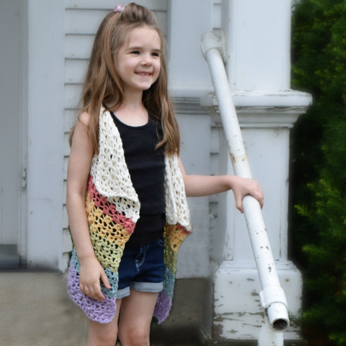 Crochet Cascade Vest Pattern for Sublime Vest in White and Rainbow stripes
