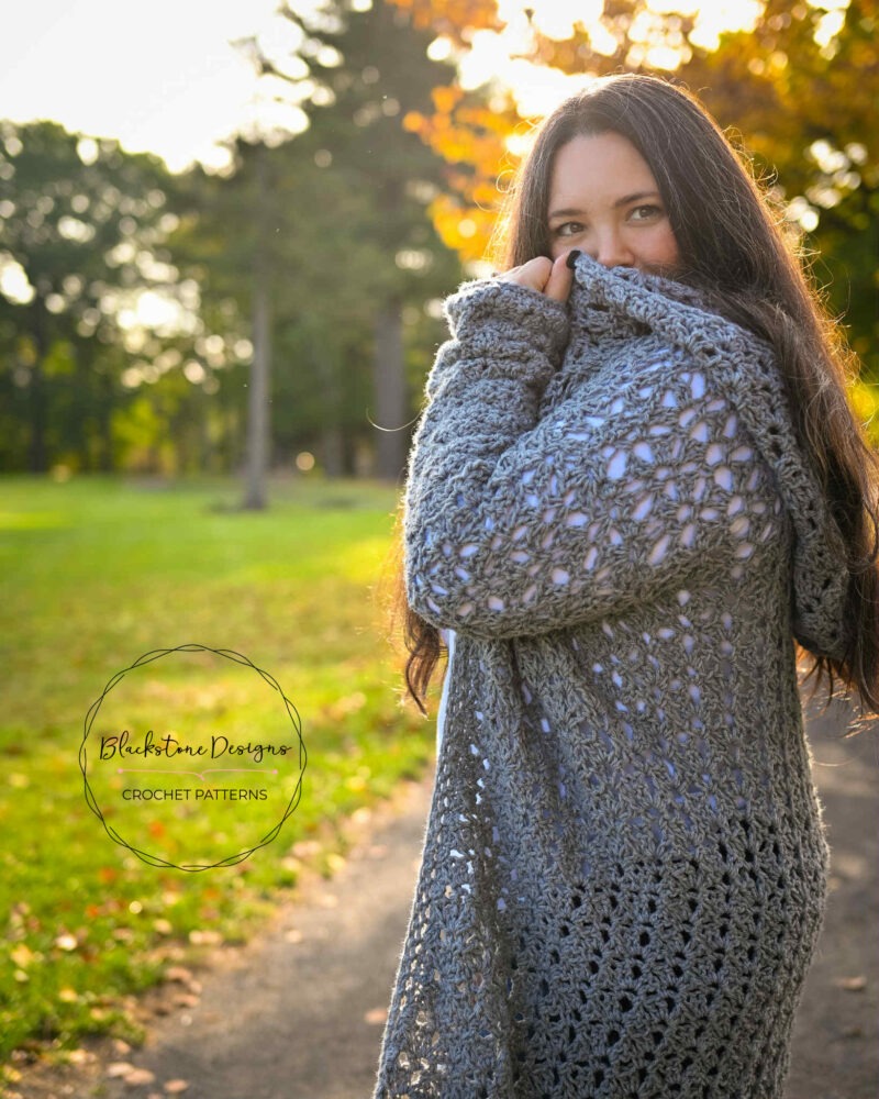 Gray Bayberry Cardigan Crochet Pattern on woman in park
